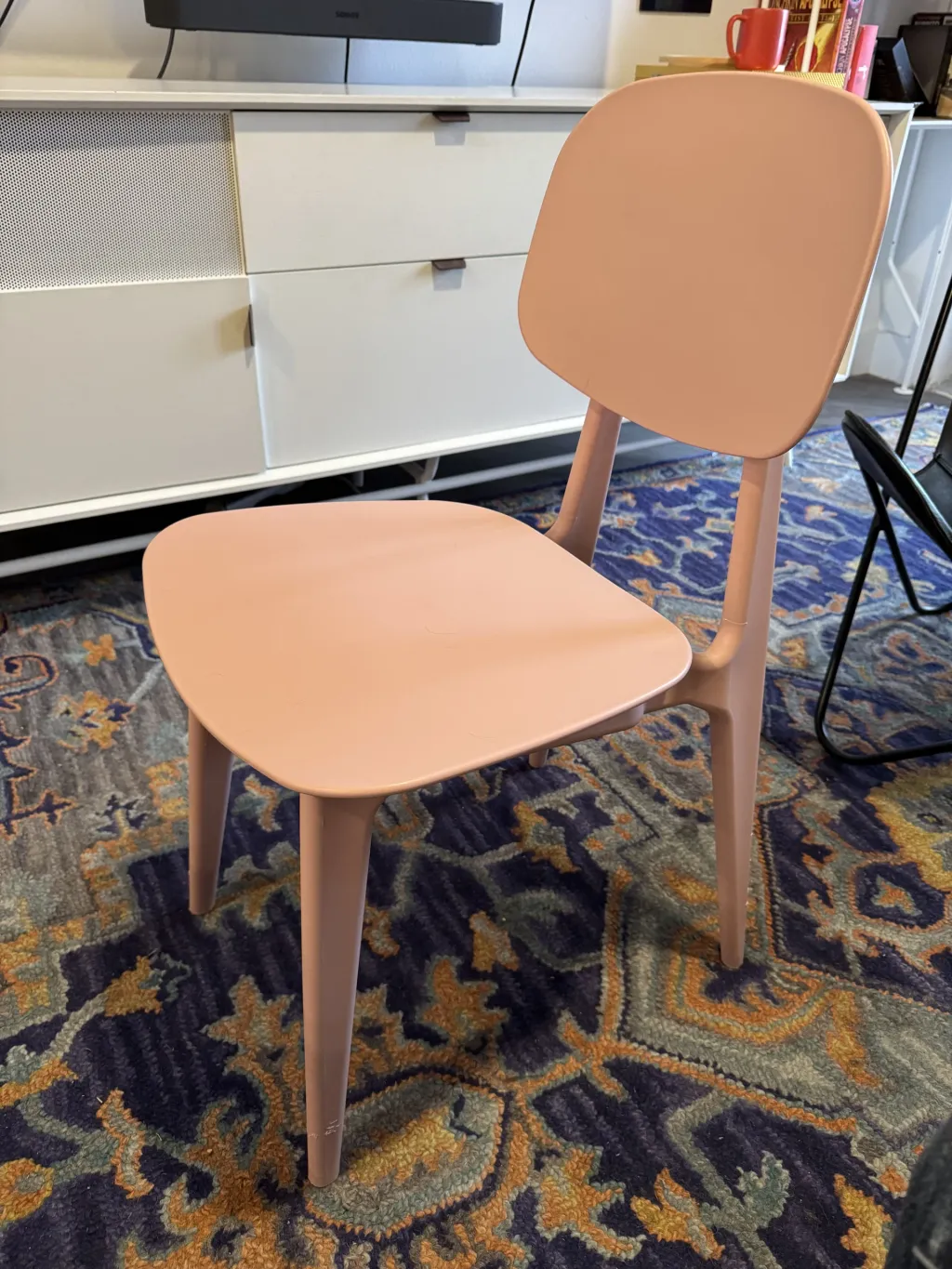 Photo 1 of Pink plastic chairs