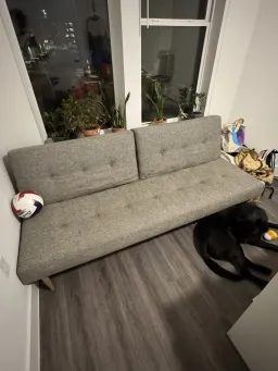 Photo of West Elm mid-century futon, retro weave feather gray